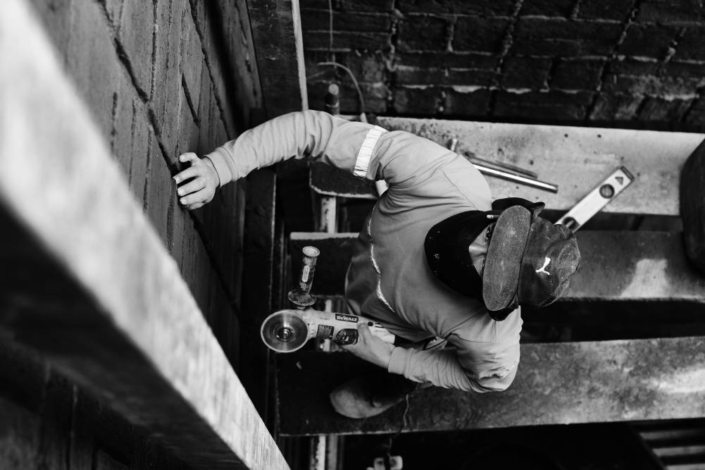 Award-nominated photo of man on a building site in Ecuador