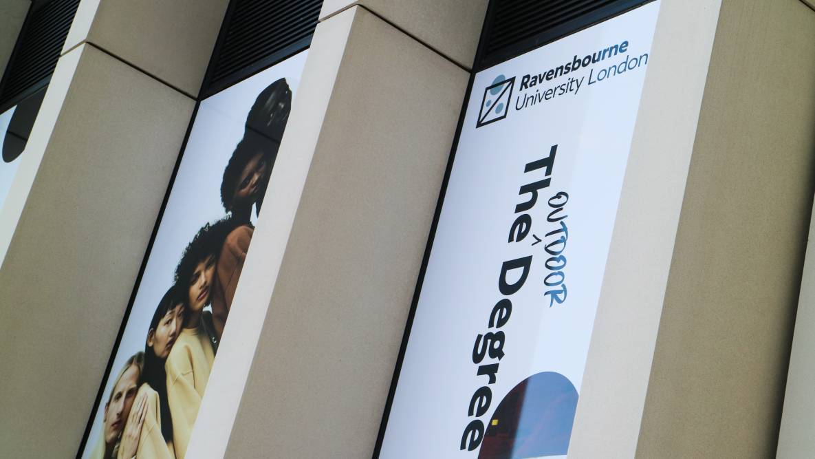 Students' work is displayed on the Ravensbourne building