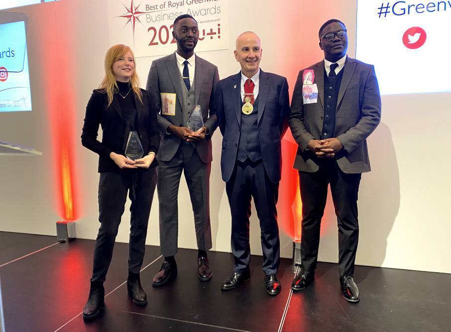 Tara Trangmar & Emmanuel and Lemuel Unaji at awards ceremony