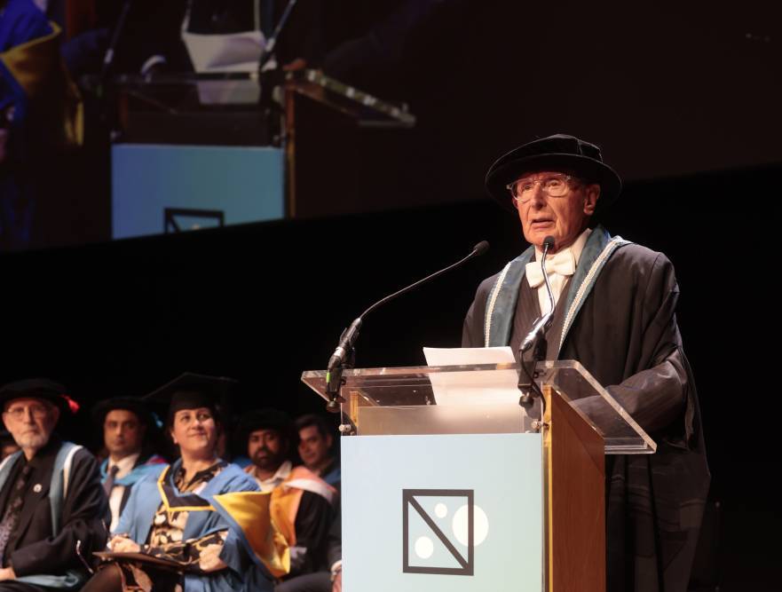 Robin Baker speaks to graduates